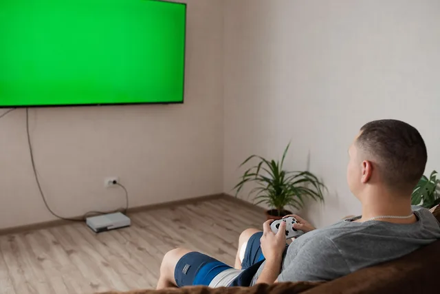 gamer, internet, joystick, player, technology, television, screen, home, play, tv, console, controller, video game, living room, mock-up, mockup, multiplayer, online, sitting, sofa, indoors, young, gamer, gamer, gamer, gamer, gamer, multiplayer. A connected TV advertising strategy framework explained simply