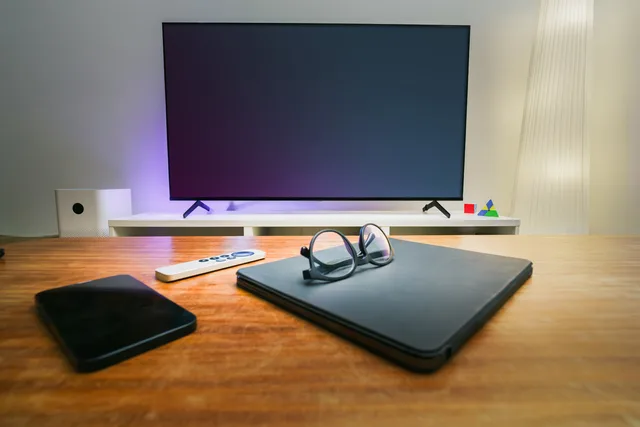 A cozy living room setup featuring smart technology and modern decor. CTV ad viewability standards UK: what buyers should know